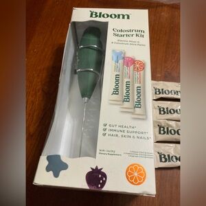 Bloom Colostrum Starter Kit with Green Mixer. New in box. Comes with 8 packets